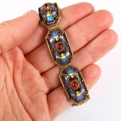 150 - ERIK POUL FENSTER - a Danish silver-gilt enamel and carnelian chinoiserie bat panel bracelet, bracel... 