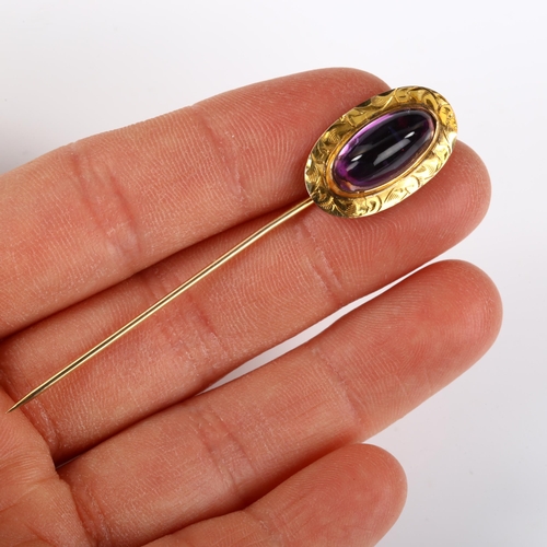 152 - A 9ct gold cabochon amethyst stick pin, bright-cut engraved foliate surround with oval cabochon, sti... 