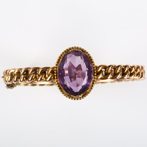 154 - A Victorian amethyst curb link hinged bangle, unmarked rose gold settings with oval mixed-cut amethy... 