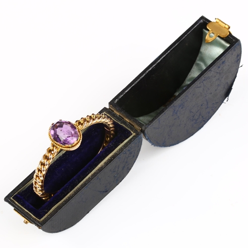 154 - A Victorian amethyst curb link hinged bangle, unmarked rose gold settings with oval mixed-cut amethy... 