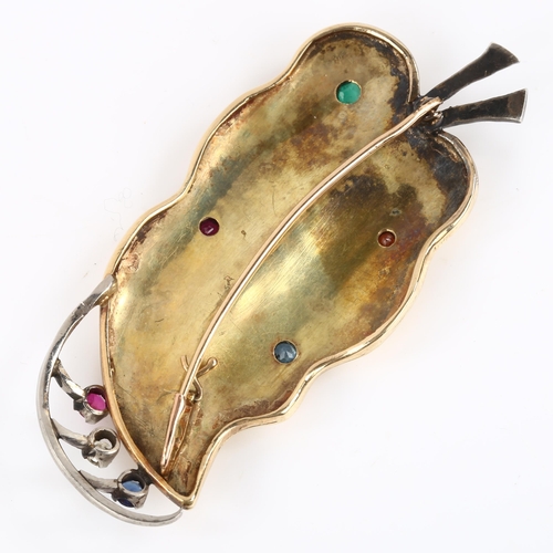 155 - A large Art Deco gem set leaf brooch, unmarked gold and silver settings, gemstones include emerald r... 