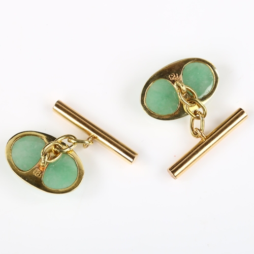 156 - A pair of Chinese 18ct gold jade oval panel cufflinks, panel length 19.1mm, 6.8g