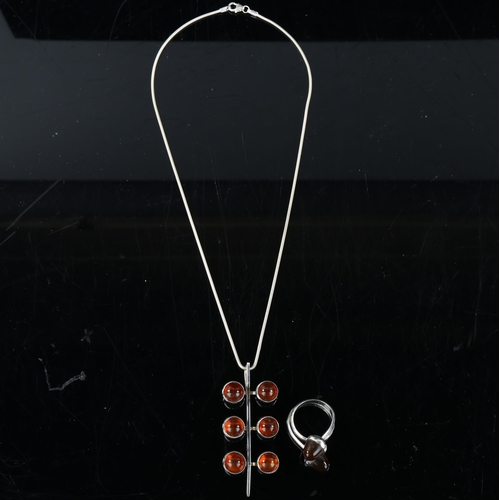 166 - NIELS ERIK FROM - a Vintage Danish stylised sterling silver and amber matching pendant necklace and ... 