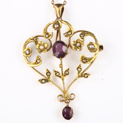 174 - An Art Nouveau 9ct gold amethyst and pearl openwork pendant necklace, on 9ct fine belcher link chain... 