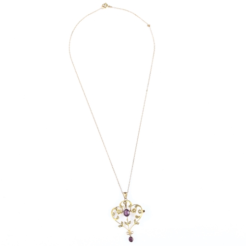 174 - An Art Nouveau 9ct gold amethyst and pearl openwork pendant necklace, on 9ct fine belcher link chain... 