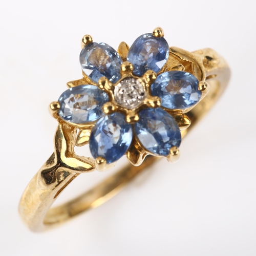 327 - A modern 9ct gold sapphire and diamond flowerhead dress ring, setting height 11.8mm, size N, 2.6g