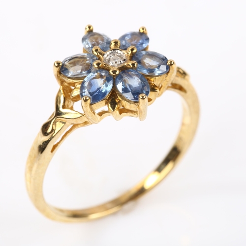 327 - A modern 9ct gold sapphire and diamond flowerhead dress ring, setting height 11.8mm, size N, 2.6g