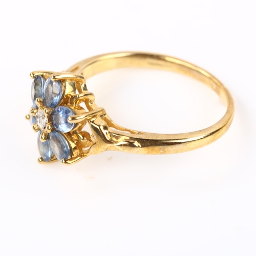 327 - A modern 9ct gold sapphire and diamond flowerhead dress ring, setting height 11.8mm, size N, 2.6g