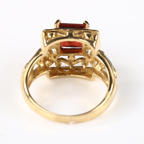 330 - A modern 9ct gold garnet dress ring, setting height 13.6mm, size N, 5.2g