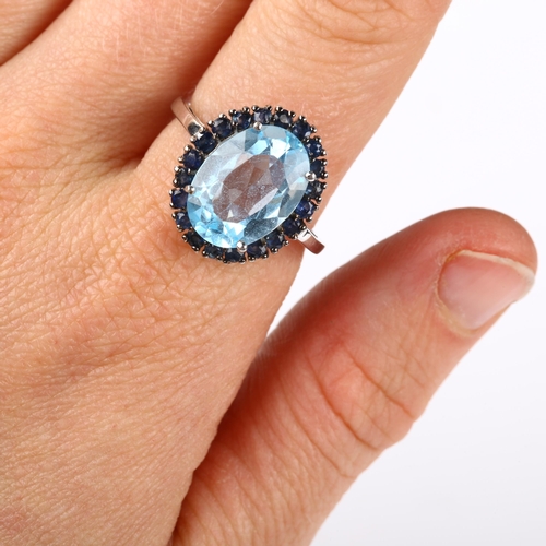 333 - A modern 9ct white gold blue topaz and sapphire cluster ring, setting height 18mm, size R, 4.6g