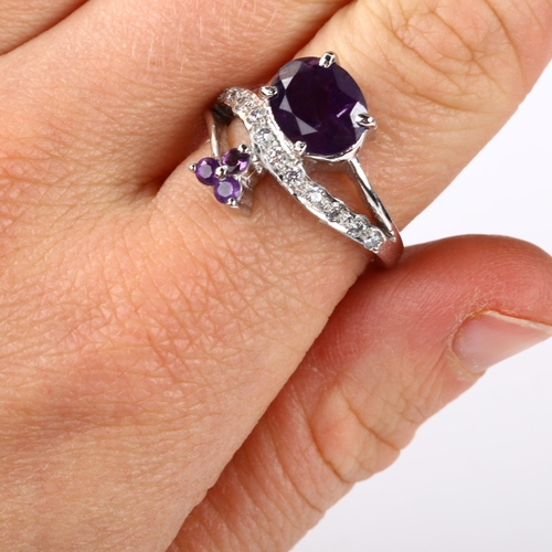 336 - 2 modern silver amethyst rings, gemstones include diamond and sapphire, sizes N and P, 9.2g total (2... 