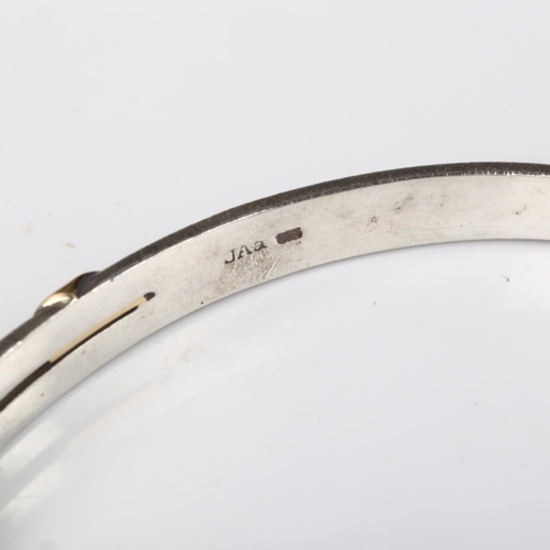 339 - A Danish oxidised and gilded sterling silver bangle and necklace, makers include Jens Jos Aagaard, b... 