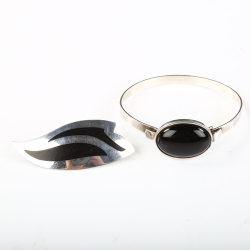 341 - 2 pieces of Danish stylised sterling silver jewellery, comprising Kai Erling Feiling black enamel br... 