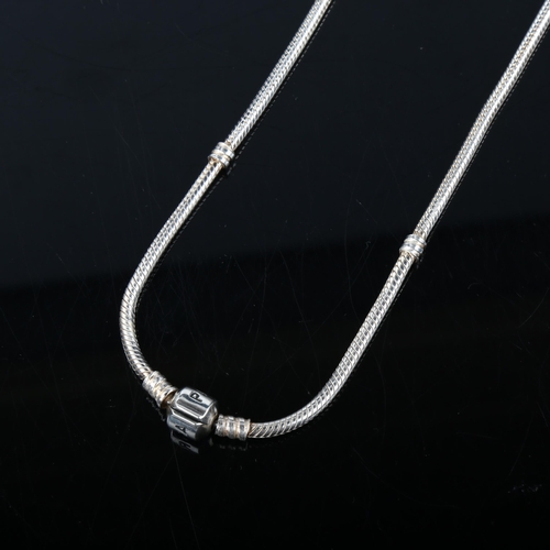 348 - PANDORA - a modern sterling silver snake link charm necklace, with 11 silver charms, necklace length... 