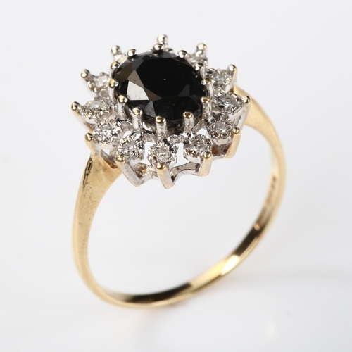 369 - A modern 9ct gold sapphire and diamond oval cluster ring, set with oval mixed-cut sapphire and singl... 