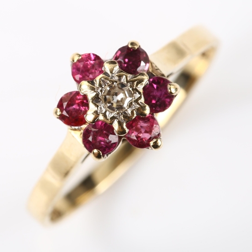 370 - A modern 9ct gold ruby and diamond flowerhead cluster ring, setting height 9.1mm, size N, 1.5g