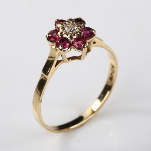 370 - A modern 9ct gold ruby and diamond flowerhead cluster ring, setting height 9.1mm, size N, 1.5g