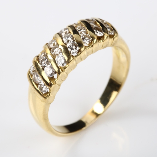 372 - A modern diamond band ring, unmarked gold settings test as 18ct, set with modern round brilliant-cut... 