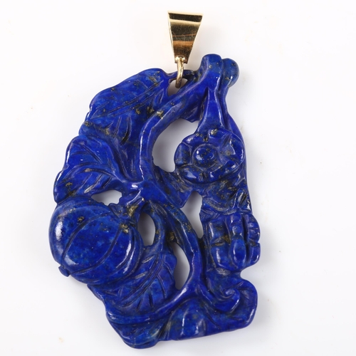 373 - A large carved lapis lazuli pendant, with unmarked gold mount, pendant height 56mm, 9g