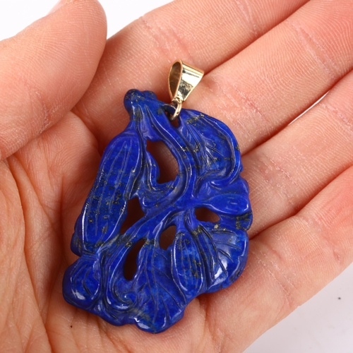 373 - A large carved lapis lazuli pendant, with unmarked gold mount, pendant height 56mm, 9g