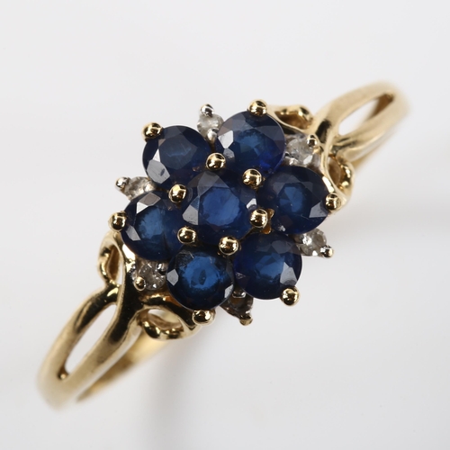 381 - A modern 9ct gold sapphire and diamond cluster ring, setting height 10.5mm, size T, 1.8g