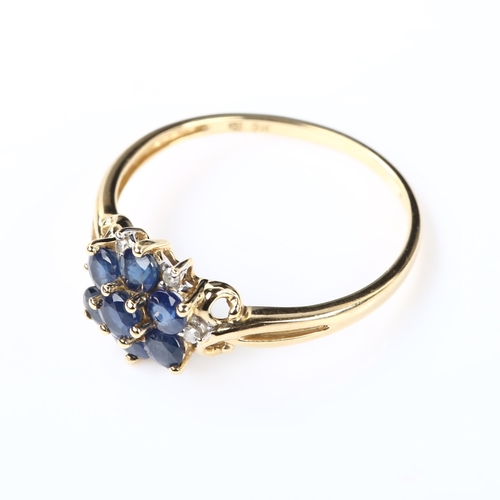 381 - A modern 9ct gold sapphire and diamond cluster ring, setting height 10.5mm, size T, 1.8g