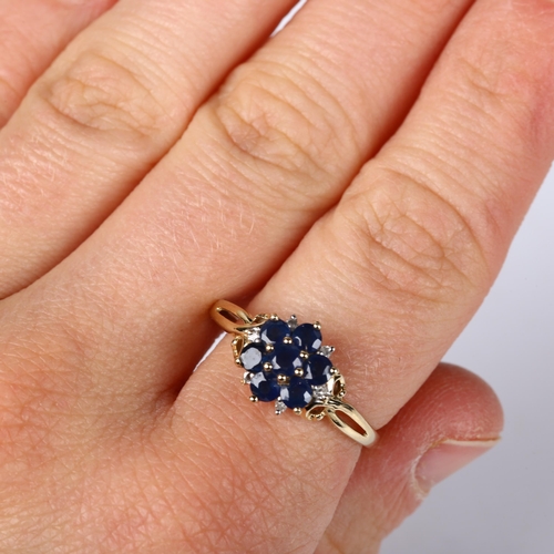 381 - A modern 9ct gold sapphire and diamond cluster ring, setting height 10.5mm, size T, 1.8g