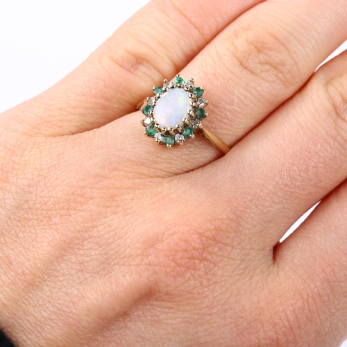 385 - A modern 9ct gold opal emerald and diamond oval cluster ring, setting height 13mm, size N, 2.3g