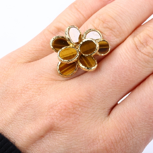 386 - A 1970s 18ct gold tigers eye abstract ring, allover textured settings, maker's marks indistinct, imp... 