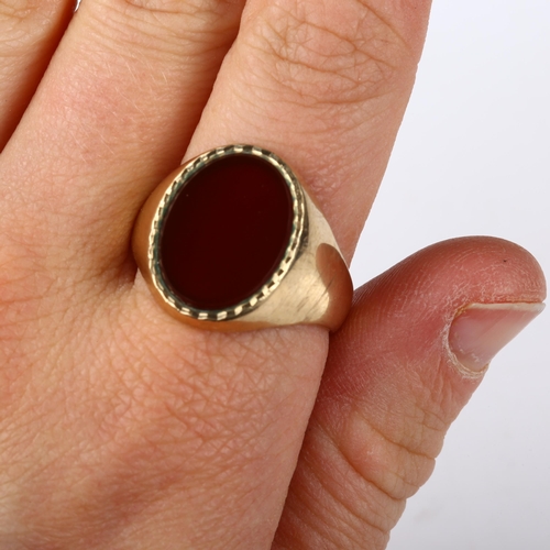 398 - A mid-20th century 9ct gold carnelian signet ring, hallmarks Birmingham 1968, setting height 18.9mm,... 