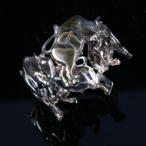 408 - FRAZER & HAWS - a set of 8 cast-silver figural raging bull napkin rings, diameter 5.5cm, each 1.8oz,... 