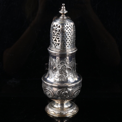 409 - A George II silver baluster sugar caster, relief embossed foliate decoration, by Thomas Bamford, hal... 