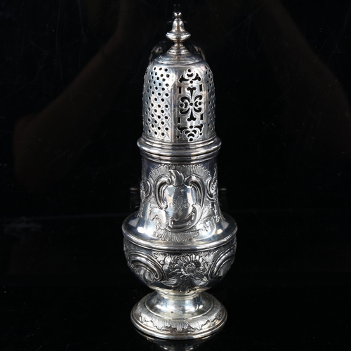 409 - A George II silver baluster sugar caster, relief embossed foliate decoration, by Thomas Bamford, hal... 