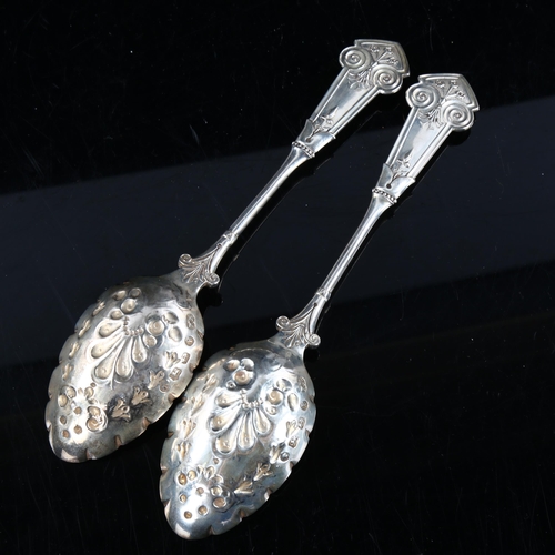 414 - ELKINGTON & CO - a pair of Victorian silver spoons, relief embossed bowls with floral handles, hallm... 