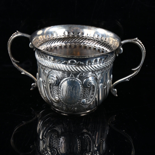 416 - A late Victorian silver 2-handled porringer, relief embossed half fluted decoration and rope twist g... 