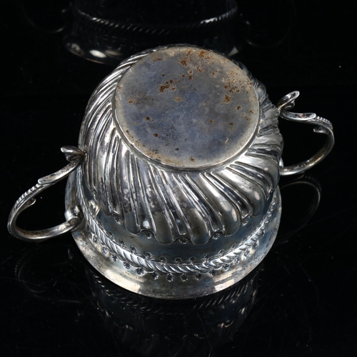 416 - A late Victorian silver 2-handled porringer, relief embossed half fluted decoration and rope twist g... 