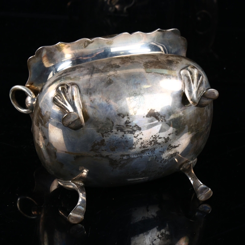 417 - An Edwardian silver tea caddy, oval bulbous form with scalloped rim and ring handles, by Boardman, G... 