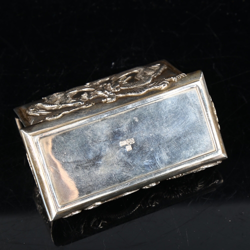 425 - A Chinese export silver dressing table ring box, relief cast dragon decoration, by Wang Hing, circa ... 