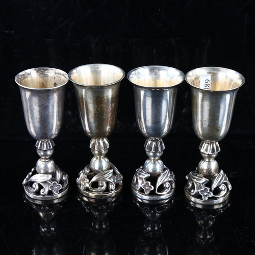 427 - GEORG JENSEN - a set of 6 American sterling silver drinking tots, model no. 13925, height 7.5cm, 9.3... 