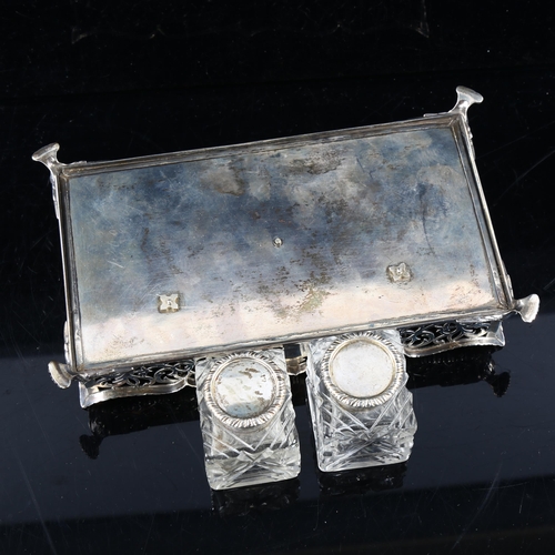 428 - A Victorian silver desk ink stand, rectangular form, with gadrooned rim and pierced floral gallery, ... 