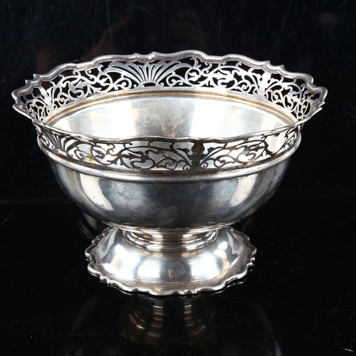 429 - A large late Victorian silver pedestal fruit bowl, with pierced scalloped rim, by Sibray, Hall & Co ... 