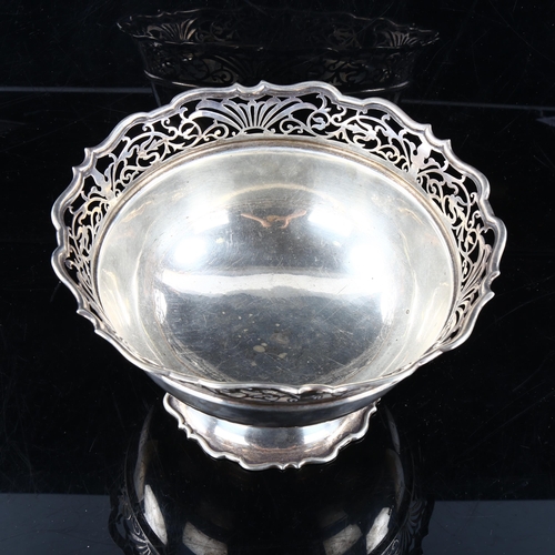 429 - A large late Victorian silver pedestal fruit bowl, with pierced scalloped rim, by Sibray, Hall & Co ... 