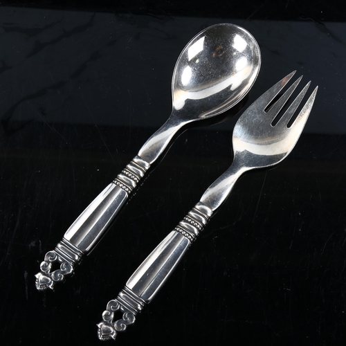 433 - GEORG JENSEN - a pair of Danish sterling silver Acorn (Konge) pattern salad servers, length 21.5cm, ... 