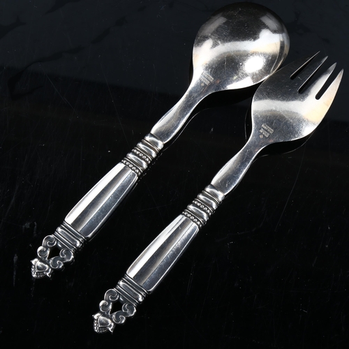 433 - GEORG JENSEN - a pair of Danish sterling silver Acorn (Konge) pattern salad servers, length 21.5cm, ... 