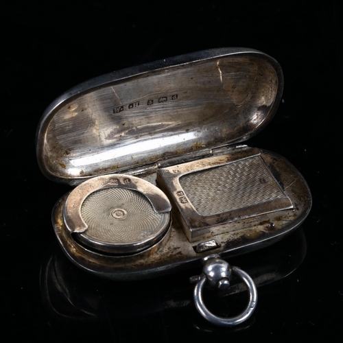 435 - An Edwardian silver novelty combination sovereign and stamp case, plain oval form, by William Hair H... 