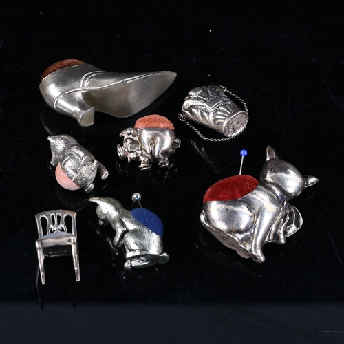 442 - A group of novelty pin cushions, including 3 silver examples, largest height 5cm (7)