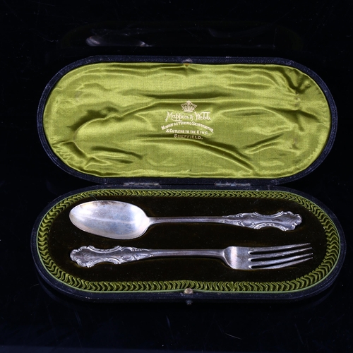 445 - MAPPIN & WEBB - a cased Edwardian silver eating set, comprising fork and spoon, hallmarks London 190... 