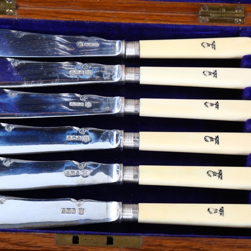 448 - A cased set of Edwardian silver-bladed ivory-handled fish cutlery for 6 people, with engraved Blackw... 