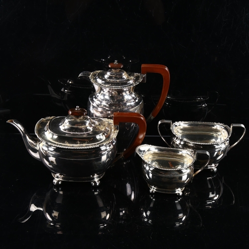 476 - ASPREY - an Edward VIII silver 4-piece tea set, comprising hot water jug, teapot, 2-handled sugar bo... 