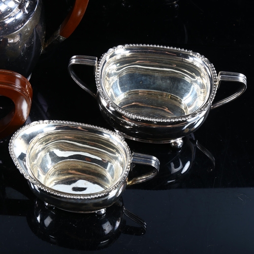 476 - ASPREY - an Edward VIII silver 4-piece tea set, comprising hot water jug, teapot, 2-handled sugar bo... 